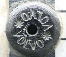 Volvo metal nameplate - detail of rivet